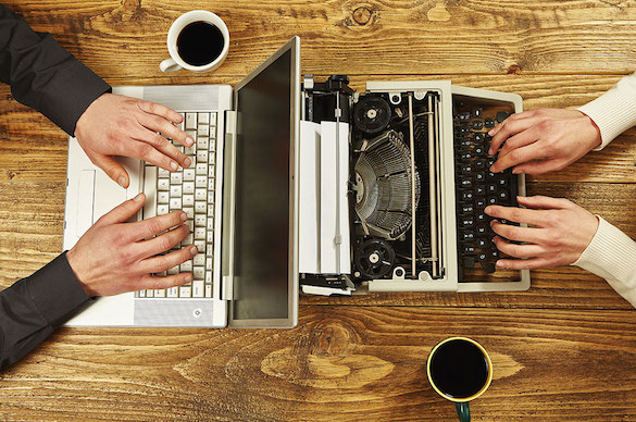 laptop and typing machine