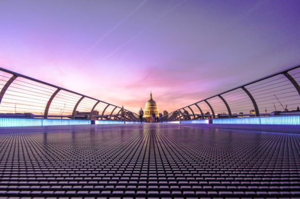 Close up of Millennium Bridge with St Pauls in the distance