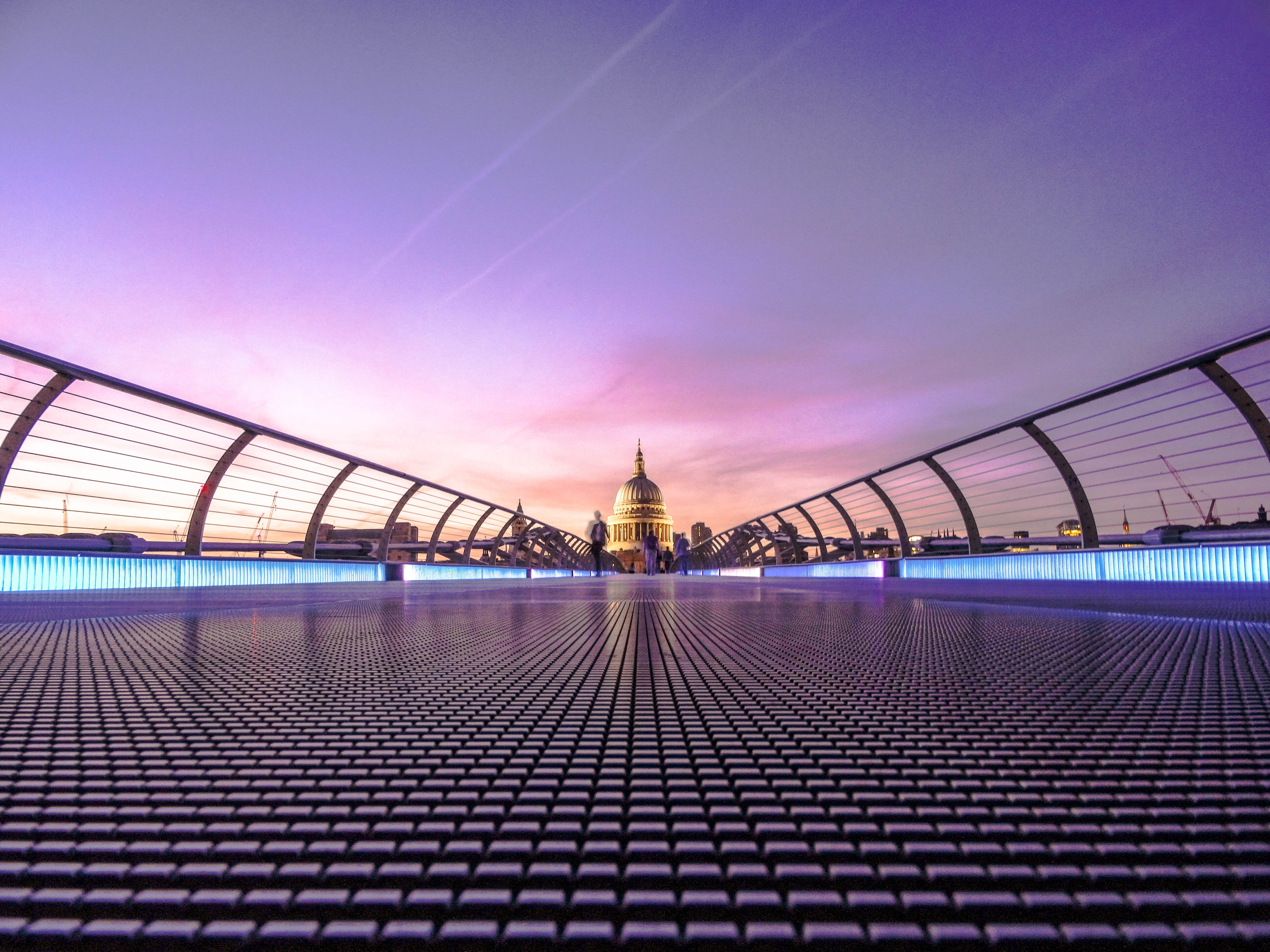 Close up of Millennium Bridge with St Pauls in the distance